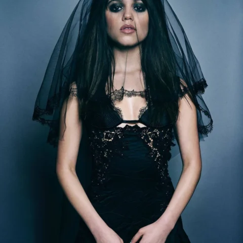 Jenna Ortega elegant sheer dress look showcasing natural curves | VaultVenus photographic vault