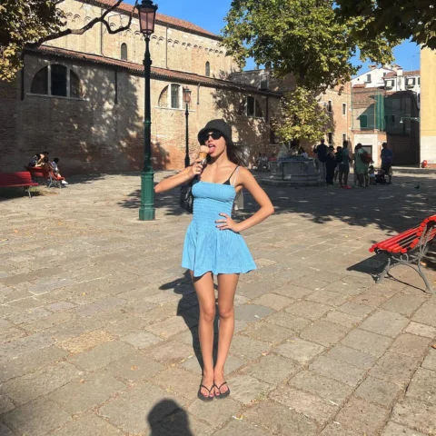 Olivia Rodrigo hot minimalist swimwear style and sun-kissed golden skin look | VaultVenus visual archive