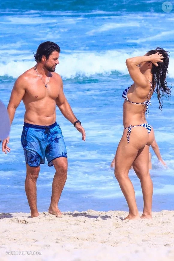 | Vaultvenus Juliana Paes at 47 Flaunts Toned Abs in Striped Bikini During Beach Day with Husband bikini photo set on VaultVenus