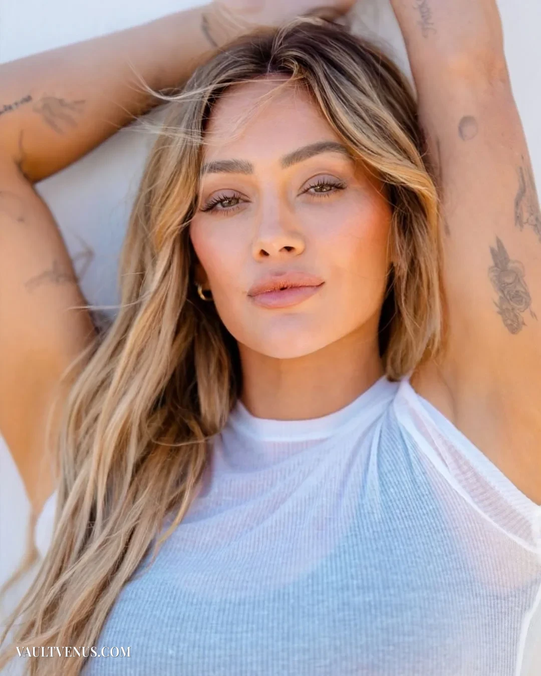 | Vaultvenus Hilary Duff bombshell in Sports Illustrated beach bikini gallery on VaultVenus